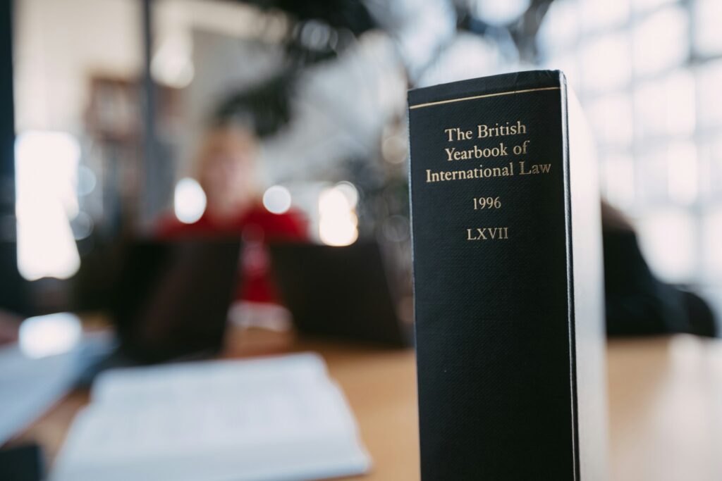 A law book is in focus.